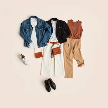 Three coordinated trendy outfits laid out with accessories on a light neutral background.