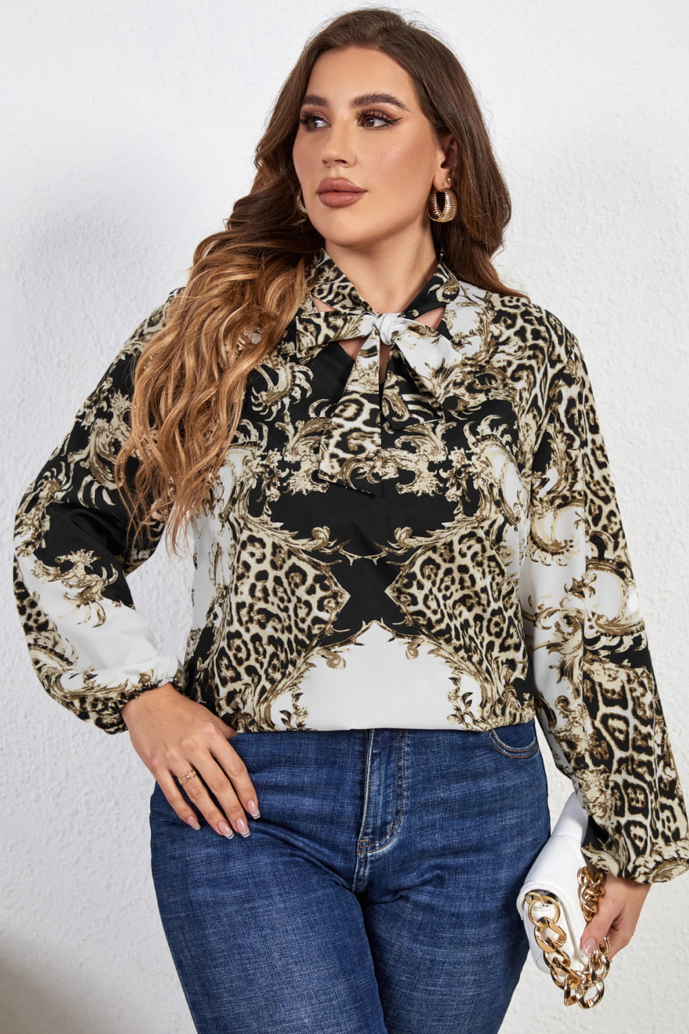 Melo Apparel Plus Size Printed Tie Neck Long Sleeve Blouse  - Doll Fits