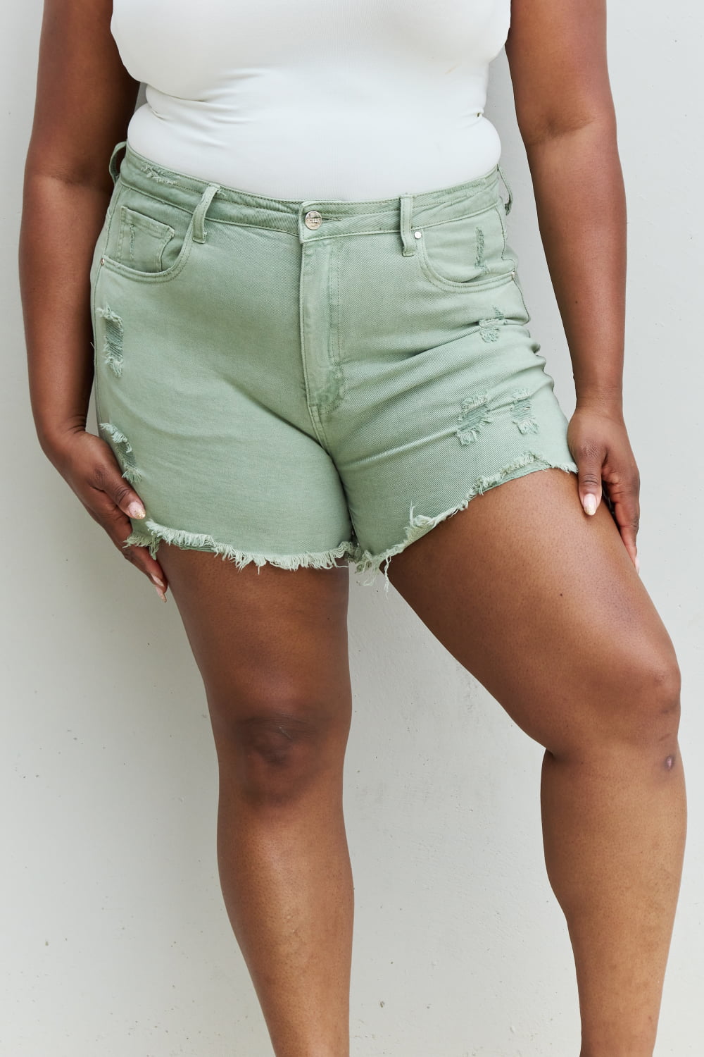RISEN Katie Full Size High Waisted Distressed Shorts in Gum Leaf  - Doll Fits