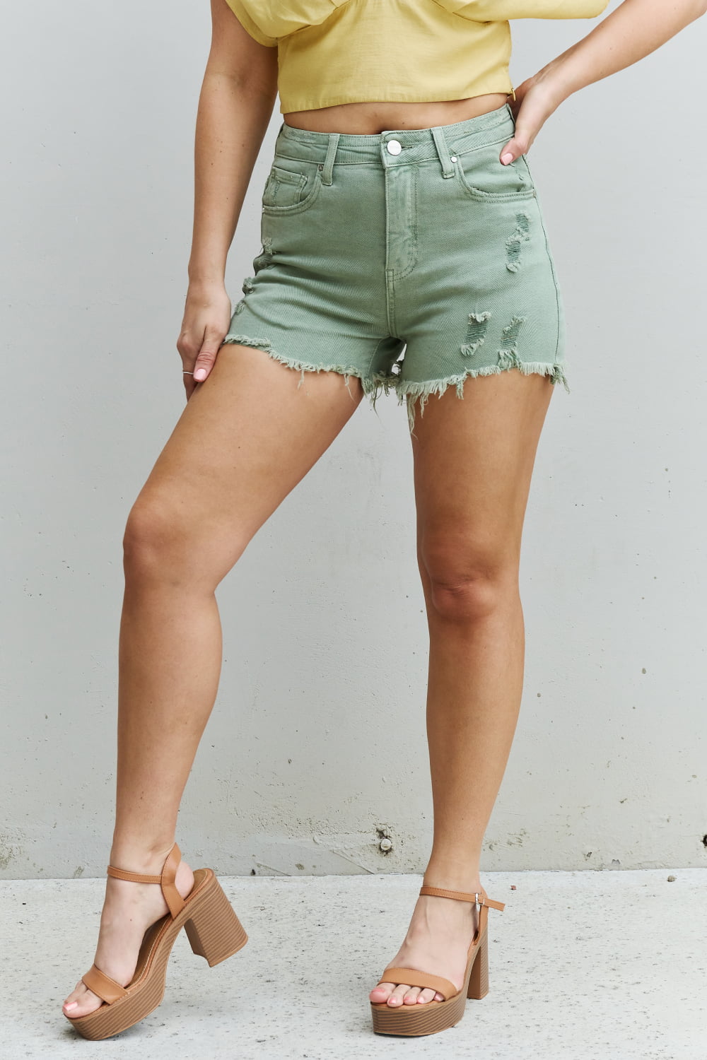 RISEN Katie Full Size High Waisted Distressed Shorts in Gum Leaf  - Doll Fits